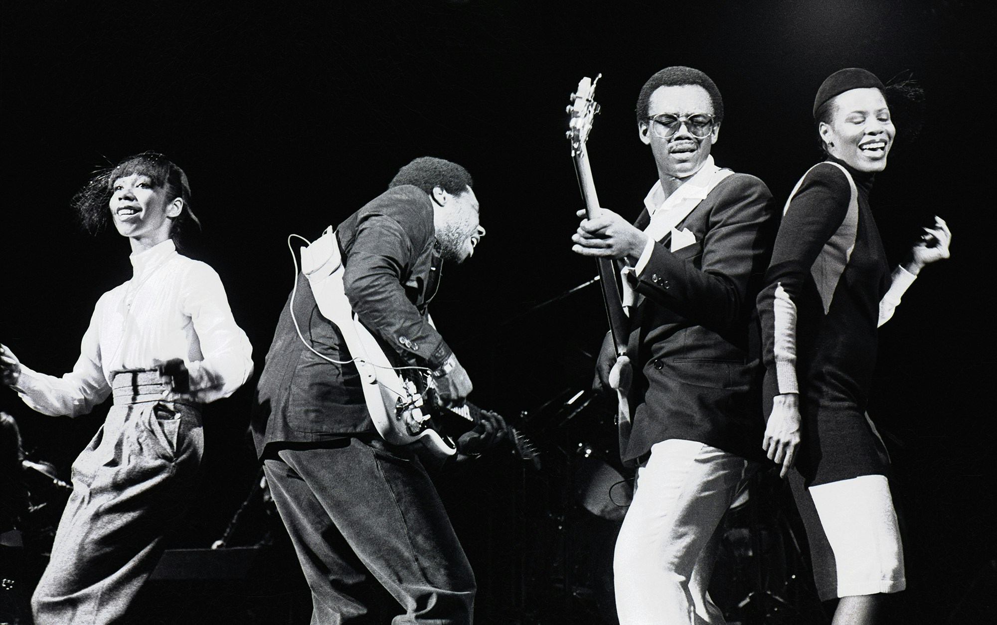 Chic onstage in London, October 1979. (left to right) Luci Martin, Nile Rodgers, Bernard Edwards, and Alfa Anderson. Photo by Gus Stewart/Redferns.